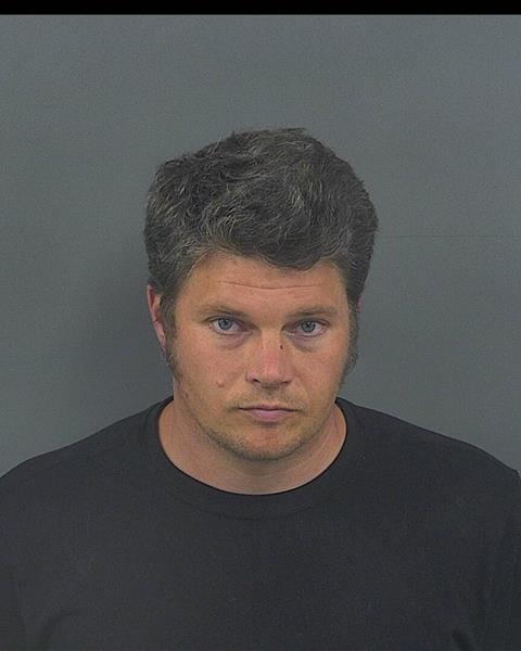 Mugshot of BENJAMIN J ISHAM