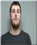 Mugshot of Adam Njos