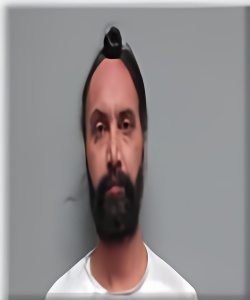 Mugshot of Sikander Singh