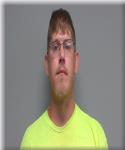 Mugshot of Devin Kollarik