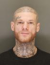Mugshot of TRAVIS RAYMOND
