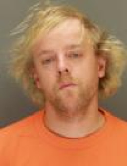 Mugshot of DUSTIN TENOLD